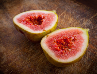 fresh figs on the wooden table.