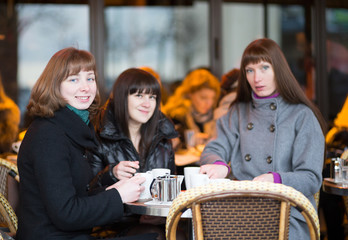 Friends in a Parisian street cafe