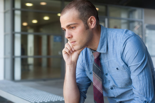 Frustrated young, handsome businessman