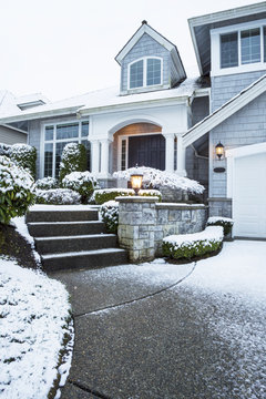 Walkway with Snow leading to Home