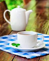 Cup of tea on wooden table