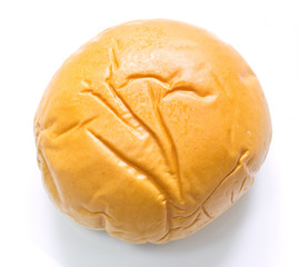 Traditional homemade round bread isolated on a white background