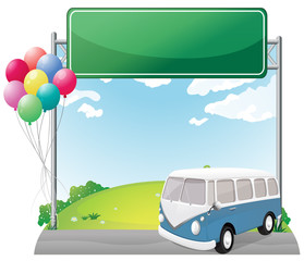 A bus near an empty board with balloons