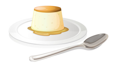 A spoon beside a plate with a leche flan