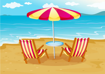 A beach umbrella with chairs at the seashore