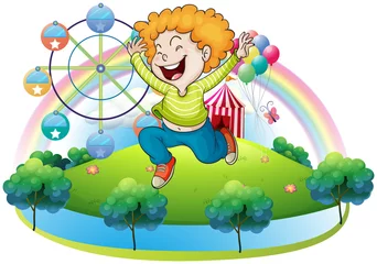 Cercles muraux Arc en ciel Un enfant heureux dans une île avec un carnaval