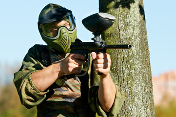 paintball player holding fire