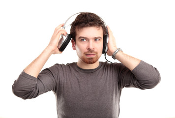 surprised young man in headphone