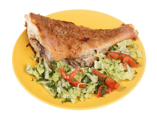Fried fish and vegetable salad