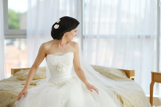 Beautiful bride in luxury hotel room