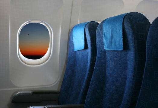 airplane seat and window