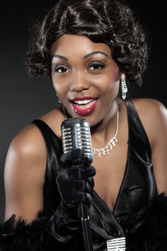 Vintage jazz woman singing. Black african american.