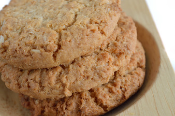 Oatmeal cookies on wood background