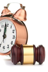 Gavel and old clock