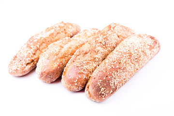 Freshly baked bread rolls with sesame