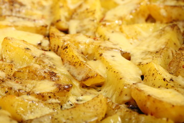 Roasted potatoes with spices and cheese