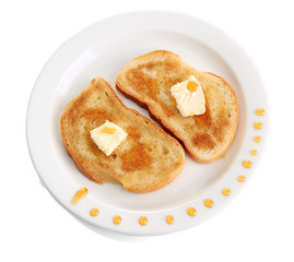 White bread toastwith honey on plate, isolated on white