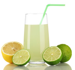 Delicious lemon juice in glass and limes and lemons next to it