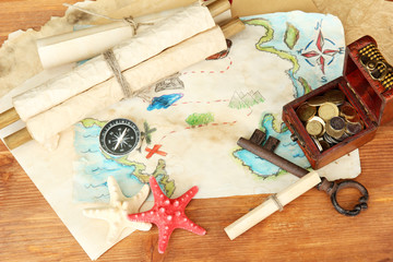 map of treasures on wooden background