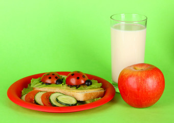 Fun food for kids on green background