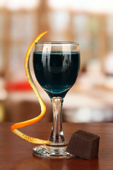 Tasty color liquor, on bright background