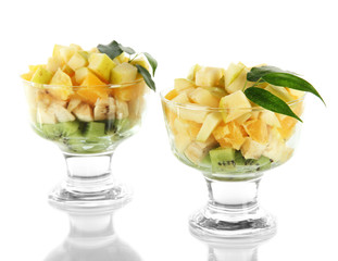Fruit salad in a sundae dish isolated on white