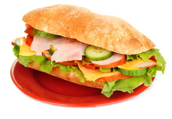 Fresh and tasty sandwich with ham and vegetables isolated