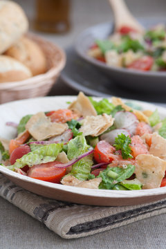 Very tasty Arabic salad (Fattoush) served in bamboo leaf plate
