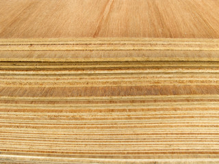 Pile of plywood sheets for construction in store