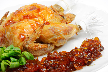 Galletto al forno con marmellata di cipolle