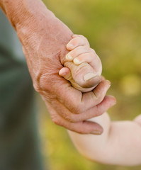 hands family grandson and old grandfather