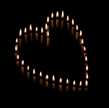 taper candles make a heart shape