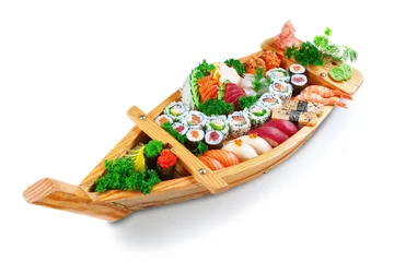 Deurstickers Collection of species sushi on the decorative plate ship. On a w © sergojpg