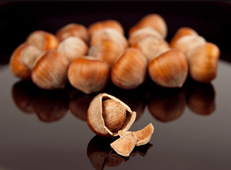hazelnuts on a black background