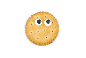 Funny cookie decorated with eyes isolated on a white background
