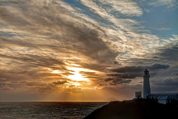 Fototapeta premium South Stack Lighthouse sunset Isle of Anglesey North wales UK
