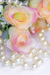 roses bouquet and string of pearls