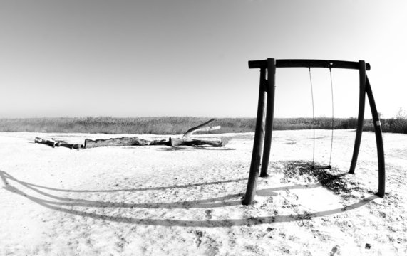 Winter landscae with swing