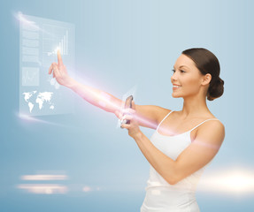 woman with smartphone and virtual screen