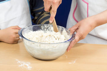 mother and son making a pizza 5