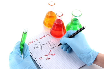 Hand scientist writing formulas isolated on white