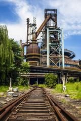 Rusted railway and abandoned steel works in outside