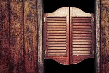 Old vintage wooden saloon doors - obrazy, fototapety, plakaty