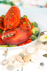 Red lobster on platter on serving table close-up