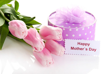 Beautiful bouquet of pink tulips and gift for Mother's Day,
