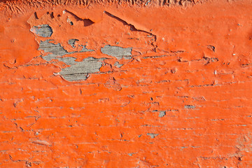 old orange paint texture peeling off wood plank background