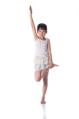 Little girl practicing yoga