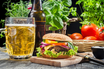 Homemade burger and a cold beer