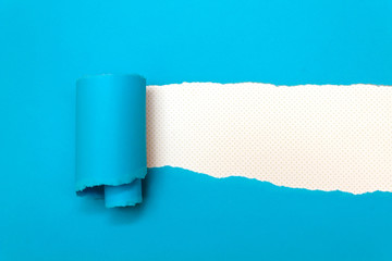 Torn blue paper with space for text