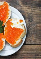 red caviar on slices of baguette